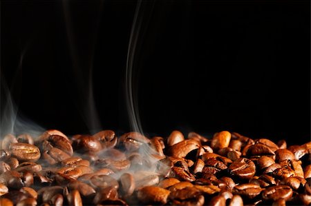 roasting coffe with smoke and black background Stock Photo - Budget Royalty-Free & Subscription, Code: 400-05240284