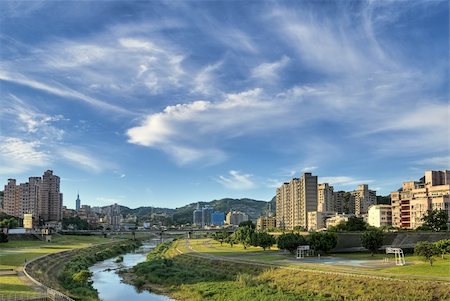 freedom tower - City scenery of park and river under blue sky and white clouds in Taipei, Taiwan. Stock Photo - Budget Royalty-Free & Subscription, Code: 400-05240586