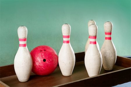 Bowling still life red ball games over green background Stock Photo - Budget Royalty-Free & Subscription, Code: 400-05240629