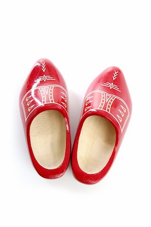 Dutch Holland red wooden shoes isolated on white studio background Stock Photo - Budget Royalty-Free & Subscription, Code: 400-05240643