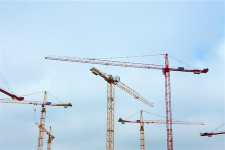 simsearch:400-05074551,k - Huge tower cranes at a construction site Foto de stock - Royalty-Free Super Valor e Assinatura, Número: 400-05242035