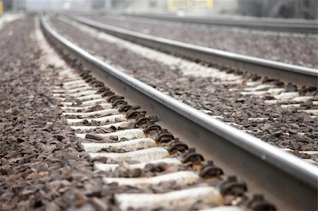 simsearch:400-06081673,k - Railway tracks closeup detail, shallow DoF Foto de stock - Super Valor sin royalties y Suscripción, Código: 400-05242058