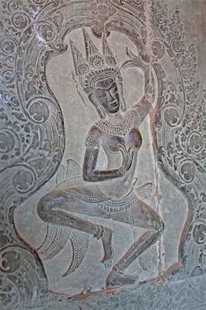 Apsara - one of thousands of unique carvings of khmer dancing girls in Angkor Wat, Cambodia Foto de stock - Super Valor sin royalties y Suscripción, Código: 400-05242400