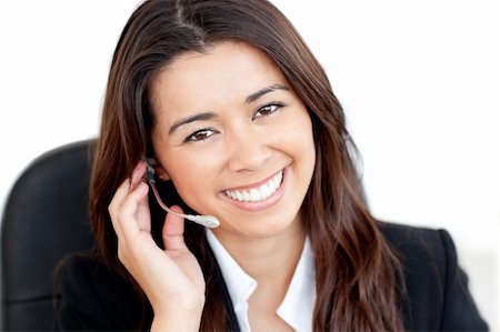 simsearch:400-04472832,k - Portrait of a charismatic asian businesswoman with headphones smiling at the camera Stock Photo - Budget Royalty-Free & Subscription, Code: 400-05242474