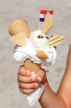 Creative Ice Cream in hand with flag of Croatia Stock Photo - Budget Royalty-Free & Subscription, Code: 400-05242879