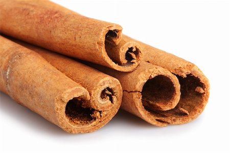 simsearch:400-04754857,k - Cinnamon sticks isolated on white background. Shallow DOF Stock Photo - Budget Royalty-Free & Subscription, Code: 400-05243304