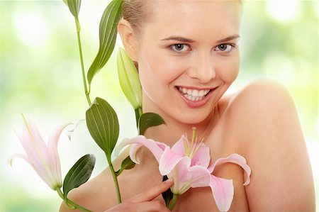 simsearch:400-04345665,k - Portrait of the attractive girl without a make-up, with lily flower in hand Foto de stock - Super Valor sin royalties y Suscripción, Código: 400-05243409