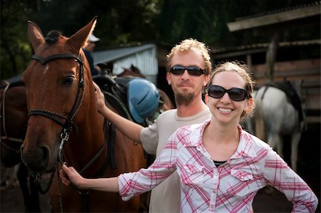 simsearch:400-04729405,k - Equestrian couple posing on a horse ranch in Costa Rica Photographie de stock - Aubaine LD & Abonnement, Code: 400-05243571