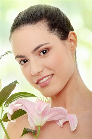 simsearch:400-04345665,k - Portrait of the attractive girl without a make-up, with lily flower in hand Foto de stock - Super Valor sin royalties y Suscripción, Código: 400-05243586