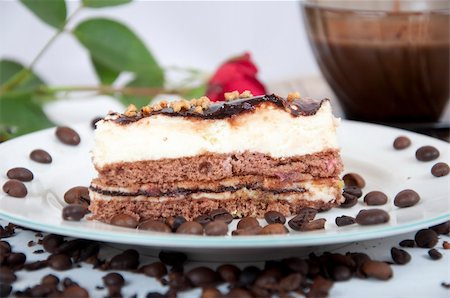 Chocolate dessert with coffee bean and coffee and rose on background Stock Photo - Budget Royalty-Free & Subscription, Code: 400-05243698