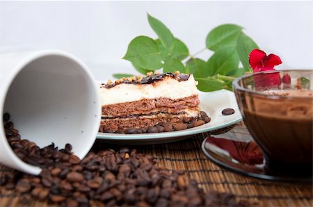 Chocolate dessert with coffee bean and coffee and rose on background Stock Photo - Budget Royalty-Free & Subscription, Code: 400-05243700