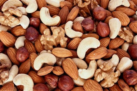 simsearch:400-04377067,k - Assorted nuts (almonds, filberts, walnuts, cashews) close up Stock Photo - Budget Royalty-Free & Subscription, Code: 400-05243726
