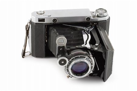 simsearch:400-04527928,k - Old folding camera isolated on white background Foto de stock - Super Valor sin royalties y Suscripción, Código: 400-05243744