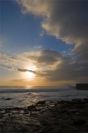 Rocky ocean coast on sunset Stock Photo - Budget Royalty-Free & Subscription, Code: 400-05243791