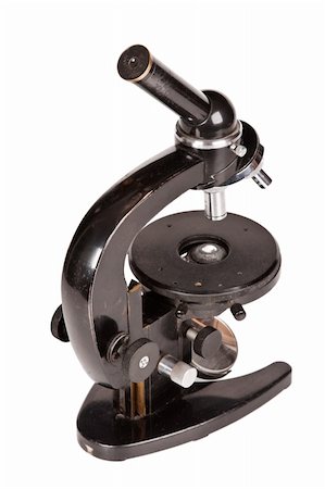 Old microscope isolated on white background Stock Photo - Budget Royalty-Free & Subscription, Code: 400-05243854