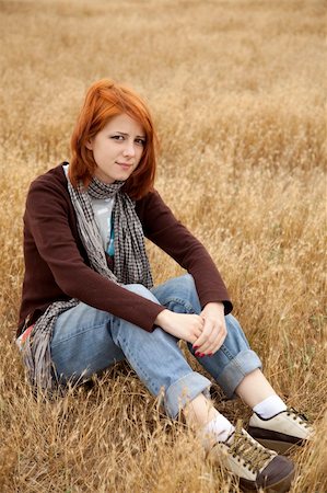 Lonely sad red-haired girl at field Stock Photo - Budget Royalty-Free & Subscription, Code: 400-05254031