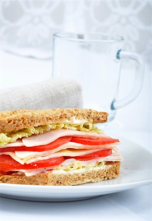 simsearch:400-07319721,k - fresh and delicious classic club sandwich over a white glass dish with glass cup Stockbilder - Microstock & Abonnement, Bildnummer: 400-05254234