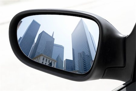 ellipse building - rearview car driving mirror view skyscraper city downtown buildings Stock Photo - Budget Royalty-Free & Subscription, Code: 400-05254273