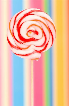 red circle lollipop - Colourful lollipop against the colourful background Stock Photo - Budget Royalty-Free & Subscription, Code: 400-05254882