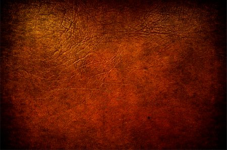 red cushion on a sofa - A grunge brown leather used like background Stock Photo - Budget Royalty-Free & Subscription, Code: 400-05254970
