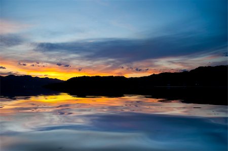 simsearch:400-04718715,k - A yellow sunset over the calm sea Stockbilder - Microstock & Abonnement, Bildnummer: 400-05254991