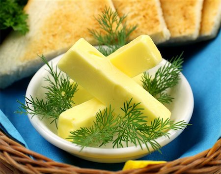 simsearch:400-05255035,k - Tray of butter sticks with Italian parsley ready to serve. Stock Photo - Budget Royalty-Free & Subscription, Code: 400-05255035