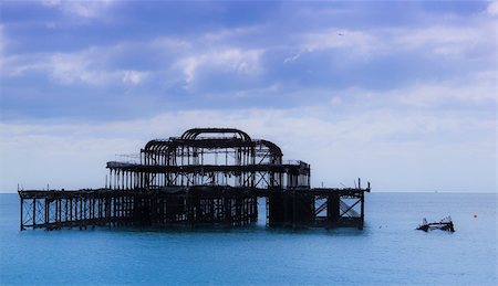 england brighton not people not london not scotland not wales not northern ireland not ireland - remains of west pier rusting in the sea off brighton beach in sussex england Stock Photo - Budget Royalty-Free & Subscription, Code: 400-05255084