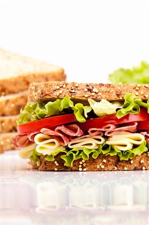Salami sandwich with cheese lettuce and tomato Stock Photo - Budget Royalty-Free & Subscription, Code: 400-05255165