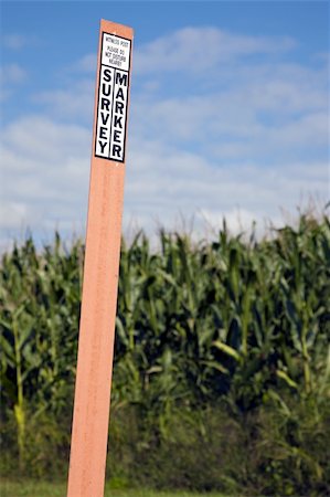 simsearch:400-04710606,k - Survey marker in the field, next to the section corner or benchmark. Stock Photo - Budget Royalty-Free & Subscription, Code: 400-05256113