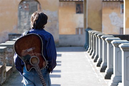 shadow acoustic guitar - man and his acoustic guitar Stock Photo - Budget Royalty-Free & Subscription, Code: 400-05256264