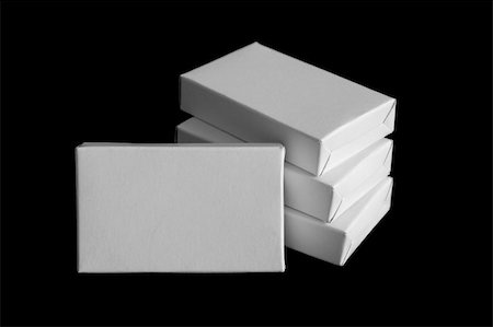 White carton boxes isolated on black background Photographie de stock - Aubaine LD & Abonnement, Code: 400-05256441