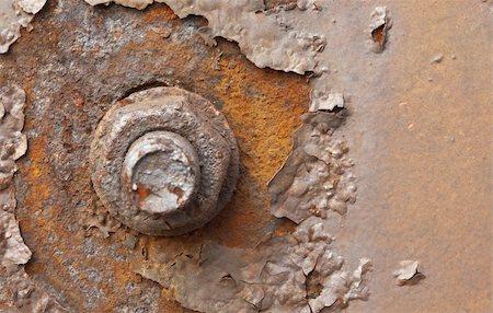 pictures of rusted iron objects - Rusty nut at the surface of steel plate closeup Stock Photo - Budget Royalty-Free & Subscription, Code: 400-05256986