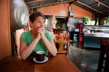 Pretty adult woman in a Costa Rican cafe Photographie de stock - Aubaine LD & Abonnement, Code: 400-05257176