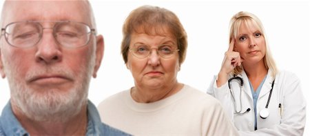 elderly couple concern - Concerned Senior Couple and Female Doctor Behind with Selective Focus the Doctor in the Back. Stock Photo - Budget Royalty-Free & Subscription, Code: 400-05257851
