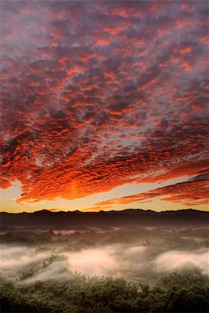 Dramatic landscape of sunrise scenery with red clouds in sky in countryside in Taiwan, Asia. Stock Photo - Budget Royalty-Free & Subscription, Code: 400-05258476