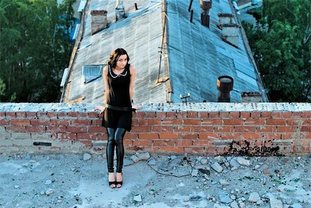 Girl sitting on roof. View from top point Stock Photo - Budget Royalty-Free & Subscription, Code: 400-05258497