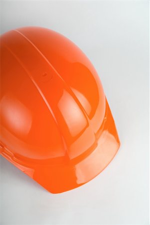 simsearch:400-04909076,k - Orange helmet closeup on a white background Stock Photo - Budget Royalty-Free & Subscription, Code: 400-05258790