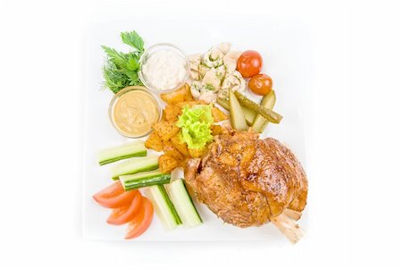 simsearch:400-04295211,k - Tasty pork dish with vegetables on a white background Fotografie stock - Microstock e Abbonamento, Codice: 400-05258952