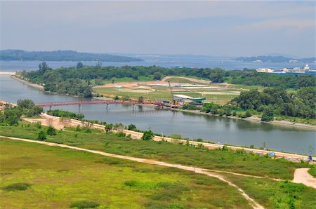 singapore tree bridge - scenic view of a river, lands, a bridge, by the sea at Punggol area Stock Photo - Budget Royalty-Free & Subscription, Code: 400-05258963