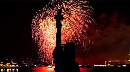 silhouette torch - The silhouette of Statue of Liberty Statue of Liberty and July 4th fireworks over Hudson River Stock Photo - Budget Royalty-Free & Subscription, Code: 400-05250017