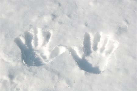 powder in water - Handprints in the snow Stock Photo - Budget Royalty-Free & Subscription, Code: 400-05250913