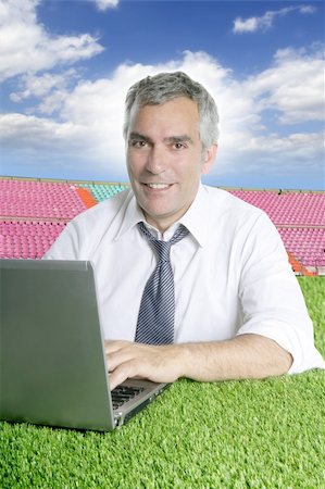 simsearch:400-04204942,k - senior businessman working green grass in sport course Stock Photo - Budget Royalty-Free & Subscription, Code: 400-05251527