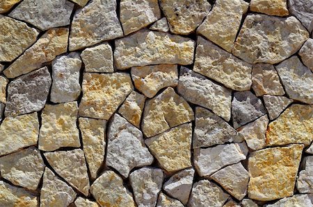 masonry stone wall rock construction pattern texture background Stock Photo - Budget Royalty-Free & Subscription, Code: 400-05251589