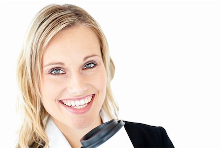 simsearch:400-04188263,k - Cheerful businesswoman holding a cup of coffee against a white background Foto de stock - Super Valor sin royalties y Suscripción, Código: 400-05251686