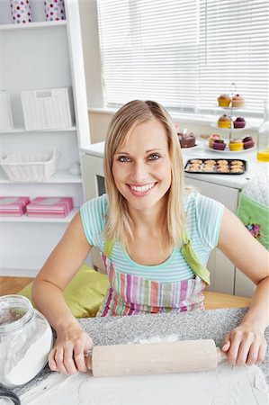 simsearch:400-04729451,k - Cheerful woman baking in the kitchen at home Stock Photo - Budget Royalty-Free & Subscription, Code: 400-05251698