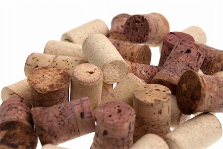 Used corks from bottles guilt isolated white background. Fotografie stock - Microstock e Abbonamento, Codice: 400-05252094