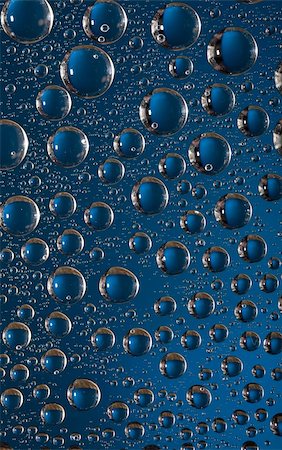 simsearch:400-05334572,k - Blue water-drops on the glass Stockbilder - Microstock & Abonnement, Bildnummer: 400-05252361