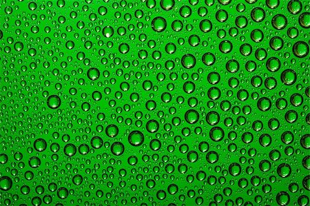 simsearch:400-05252366,k - Water drops on green glass Stock Photo - Budget Royalty-Free & Subscription, Code: 400-05252379