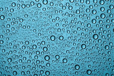simsearch:400-04074032,k - Blue water drops on glass window Stock Photo - Budget Royalty-Free & Subscription, Code: 400-05252383