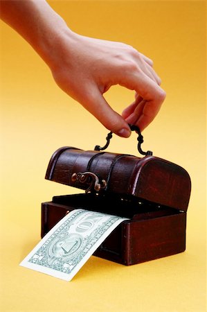 simsearch:400-07774250,k - Wood cashbox isolated on yellow Stock Photo - Budget Royalty-Free & Subscription, Code: 400-05252659
